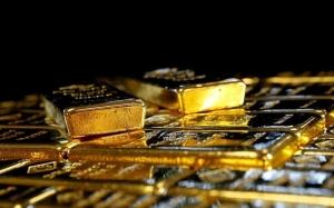 الذهب عالق في نطاق ضيق مع ترقب المستثمرين بيانات التضخم الأمريكية