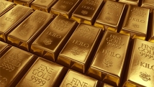 الذهب يتراجع مع قوة الدولار؛ والأسواق تترقب بيان الإحتياطي الفيدرالي