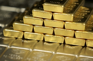 أسعار الذهب تتراجع مع ارتفاع الأسهم الذي يفوق ضعف الدولار
