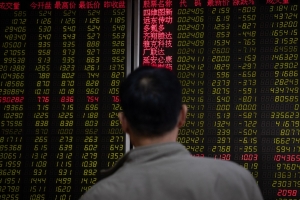 تراجعت الأسهم الآسيوية  والدولار مدعومًا حيث يعاني الاسترليني