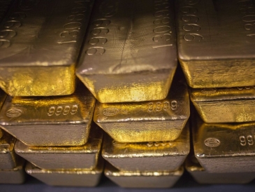 الذهب مستقر حول 1200 دولار تحت تأثير قوة الدولار