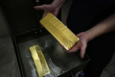 من هو &quot;حوت&quot; الذهب الذي يلتقف المعدن كلما نزل دون 1800 دولار !
