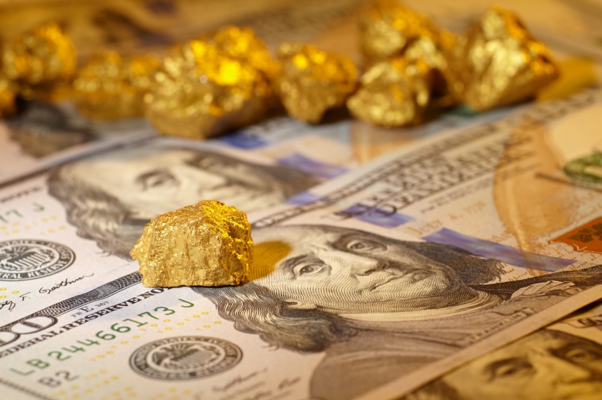 الذهب ينخفض بفعل جني الارباح واستقرار الدولار