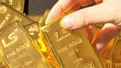 الذهب يحتفظ بقوته مع قياس الاسواق لتوقعات الفائدة الأمريكية