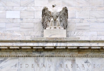 الاحتياطي الفيدرالي يرفع أسعار الفائدة ويخفض توقعاته لمرات الزيادة في 2019