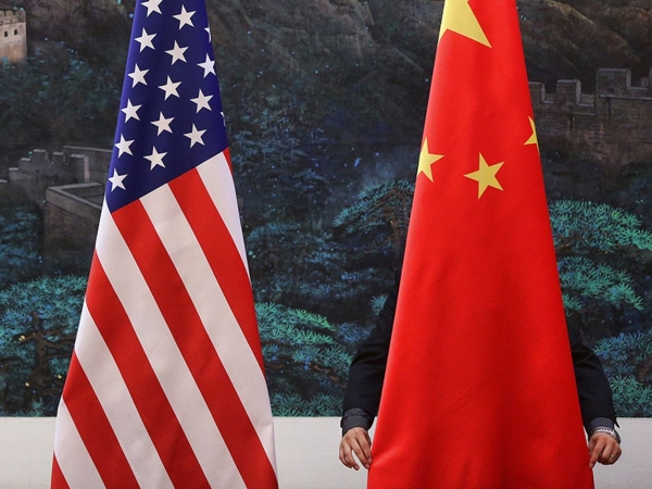 الصين تتعهد بحماية مصالحها من تهديدات تجارية أمريكية &quot;طائشة&quot;