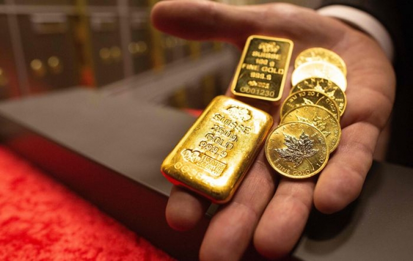 الذهب يتراجع مع ارتفاع الدولار، وترقب لمتحدثي الاحتياطي الفيدرالي