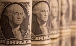 الدولار يحتفل بعام 2022 بمكاسب وسط مزاج إيجابي للعام الجديد