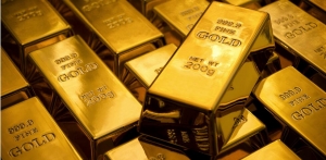 الذهب خافت بفعل الحذر بشأن الاحتياطي الفيدرالي ومقاومته للمخاطر الاوكرانية